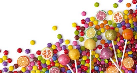 点击打开原图 Candy is more brightly colored and intensely flavored